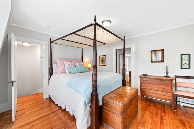 bedroom featuring wood finished floors