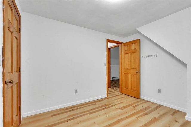 bonus room featuring light hardwood / wood-style floors