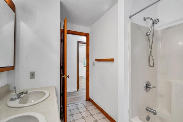 bathroom with vanity and shower / tub combination