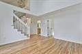 unfurnished living room featuring wood finished floors