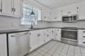 kitchen with range and dark countertops