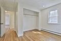 unfurnished bedroom featuring wood finished floors