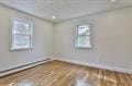 unfurnished room with wood finished floors