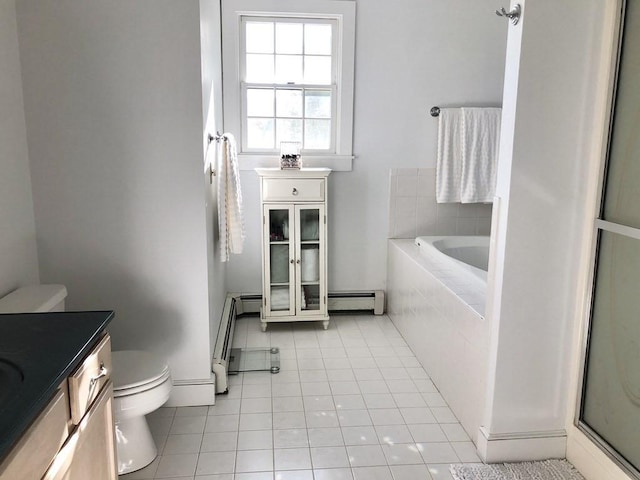 full bath featuring baseboard heating, tile patterned flooring, toilet, a bath, and a baseboard radiator