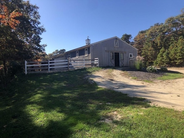 view of outdoor structure featuring an outbuilding and an exterior structure