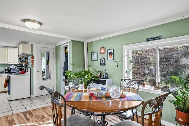 dining area with light tile patterned flooring