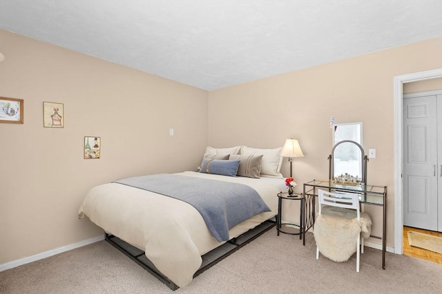 bedroom featuring light colored carpet