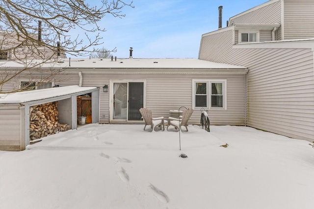 view of snow covered property