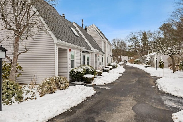 view of snow covered property