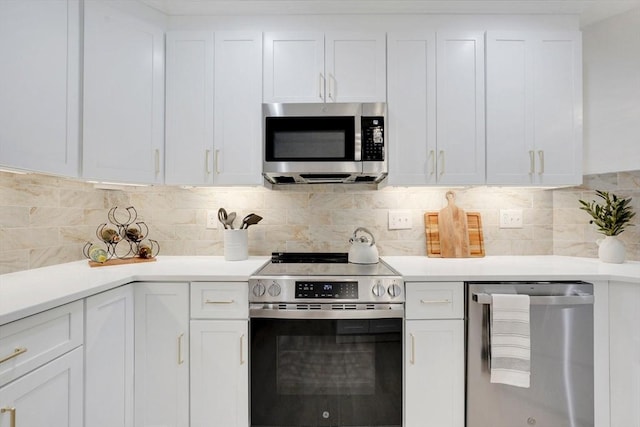 831 Morgan Rd, West Springfield, MA 01089 - kitchen featuring appliances with stainless steel finishes, light countertops, and white cabinets