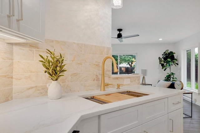 831 Morgan Rd, West Springfield, MA 01089 - kitchen featuring plenty of natural light, white cabinets, a peninsula, backsplash, and recessed lighting