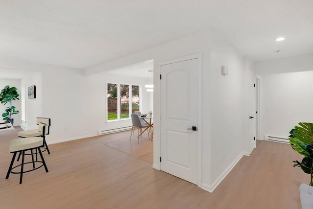831 Morgan Rd, West Springfield, MA 01089 - hall featuring light wood finished floors, baseboard heating, and recessed lighting