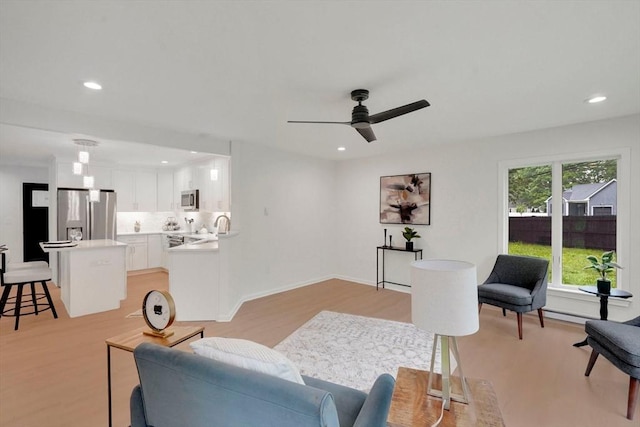831 Morgan Rd, West Springfield, MA 01089 - living room with light wood-style floors, ceiling fan, and recessed lighting