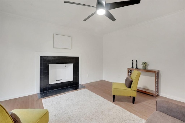 831 Morgan Rd, West Springfield, MA 01089 - living room with wood finished floors, ceiling fan, and crown molding