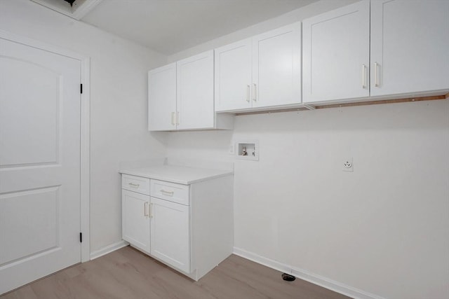 831 Morgan Rd, West Springfield, MA 01089 - laundry room with cabinet space, washer hookup, and light wood-style flooring