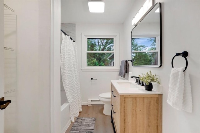 831 Morgan Rd, West Springfield, MA 01089 - full bathroom with vanity, wood finished floors, shower / bath combo, and a baseboard heating unit