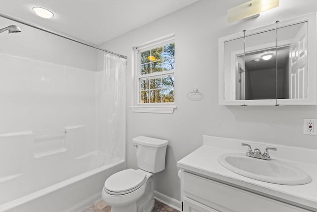 bathroom featuring vanity, shower / tub combo, toilet, and baseboards