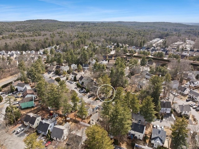 bird's eye view with a forest view