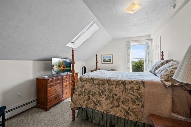 48 Northey St Unit 48, Salem, MA 01970 - bedroom featuring a baseboard heating unit, light carpet, lofted ceiling, a skylight, and a textured ceiling