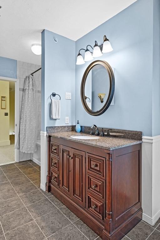 48 Northey St Unit 48, Salem, MA 01970 - full bathroom with vanity and tile patterned flooring