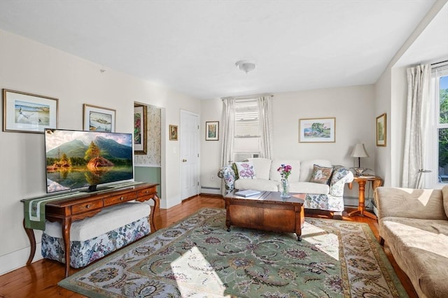 48 Northey St Unit 48, Salem, MA 01970 - living area with a baseboard heating unit, wood finished floors, and baseboards