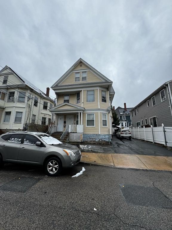 view of front of home with fence