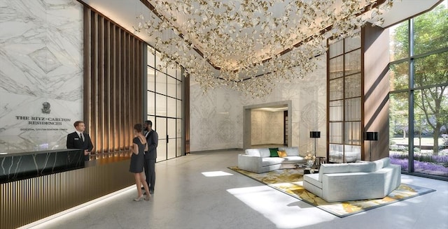 682 Atlantic Ave Unit 37G, Boston, MA 02111 - community lobby featuring a high ceiling