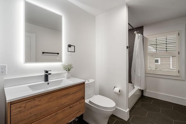 bathroom featuring vanity, baseboards, tile patterned flooring, toilet, and shower / tub combo with curtain