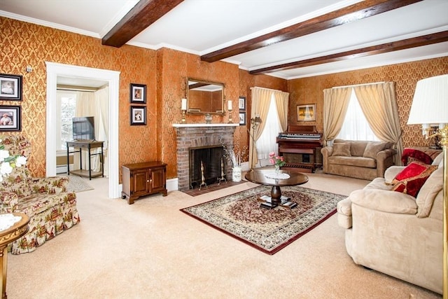 living room with crown molding, beam ceiling, light carpet, and a brick fireplace