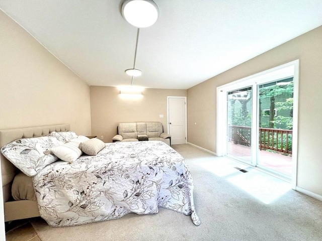 194 Captain Eames Cir Unit 194, Ashland, MA 01721 - bedroom with access to exterior, carpet flooring, and baseboards