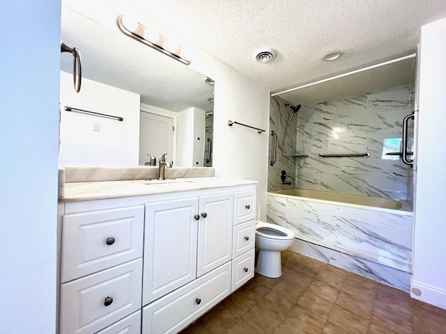 194 Captain Eames Cir Unit 194, Ashland, MA 01721 - full bath featuring a textured ceiling, toilet, vanity, and a combined bath / shower with marble appearance