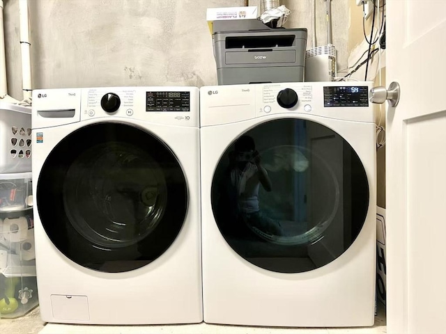 194 Captain Eames Cir Unit 194, Ashland, MA 01721 - laundry room featuring washing machine and dryer