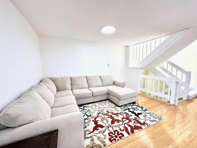 194 Captain Eames Cir Unit 194, Ashland, MA 01721 - living room with wood-type flooring and stairs