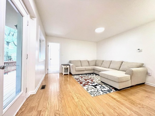 194 Captain Eames Cir Unit 194, Ashland, MA 01721 - living area featuring wood finished floors and baseboards