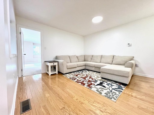 194 Captain Eames Cir Unit 194, Ashland, MA 01721 - living area featuring wood finished floors and baseboards