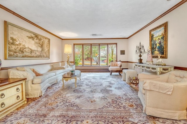 living room featuring crown molding