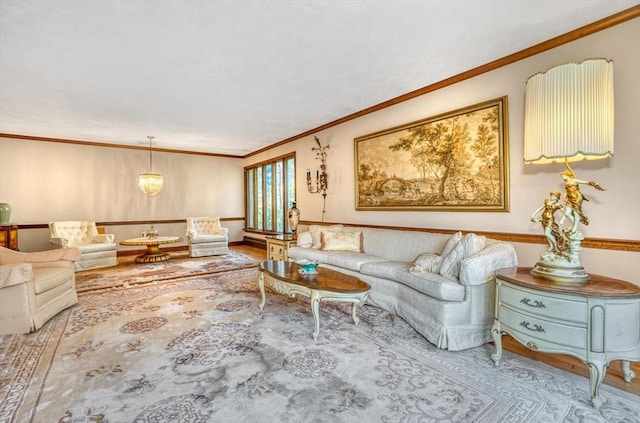 living room featuring crown molding and an inviting chandelier