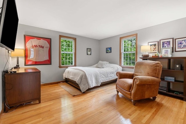 1857 Great Pond Rd, North Andover, MA 01845 - bedroom with light wood-type flooring and baseboards