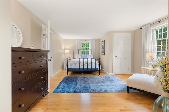 1857 Great Pond Rd, North Andover, MA 01845 - bedroom featuring light wood-style flooring and baseboards