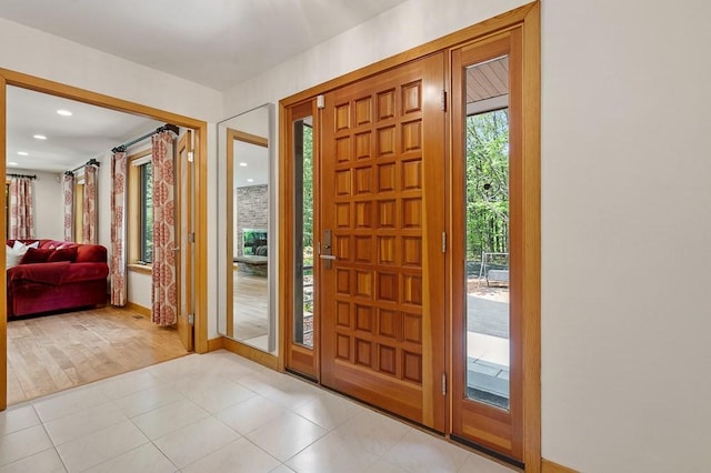 foyer with light tile patterned floors