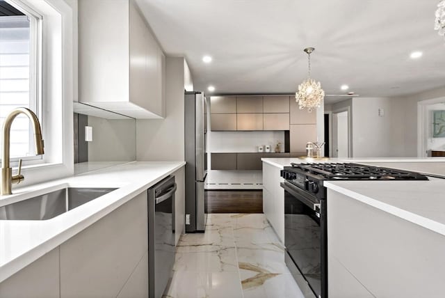 23 Donna St, Westport, MA 02790 - kitchen with stainless steel appliances, a sink, modern cabinets, light marble finish flooring, and recessed lighting