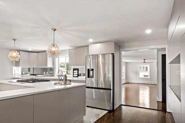 23 Donna St, Westport, MA 02790 - kitchen featuring appliances with stainless steel finishes, a chandelier, modern cabinets, healthy amount of natural light, and recessed lighting