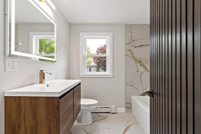 23 Donna St, Westport, MA 02790 - bathroom with a baseboard heating unit, marble tiled floors, vanity, and toilet
