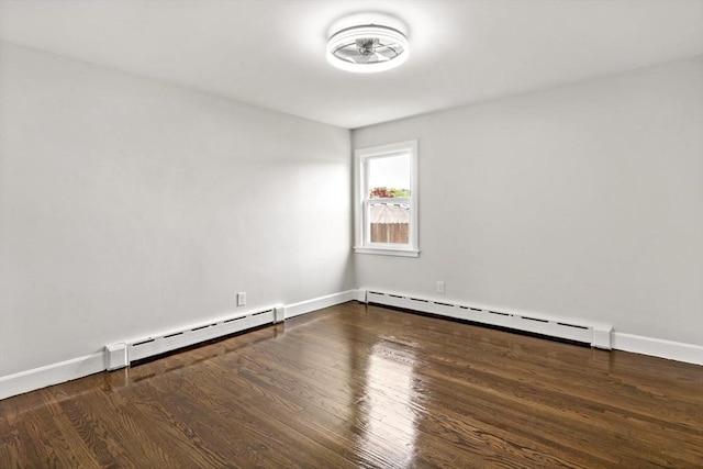 23 Donna St, Westport, MA 02790 - unfurnished room with a baseboard heating unit, wood finished floors, and baseboards