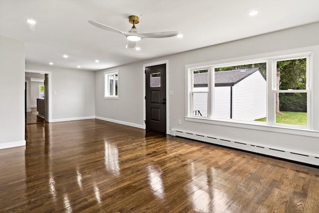 23 Donna St, Westport, MA 02790 - unfurnished living room with a baseboard heating unit, plenty of natural light, ceiling fan, wood finished floors, and recessed lighting