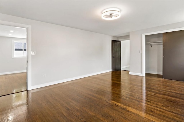 23 Donna St, Westport, MA 02790 - unfurnished bedroom featuring a closet, wood finished floors, and baseboards