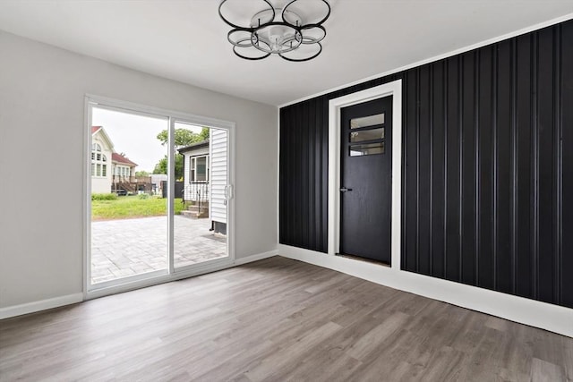 23 Donna St, Westport, MA 02790 - spare room featuring a chandelier, wood finished floors, and baseboards