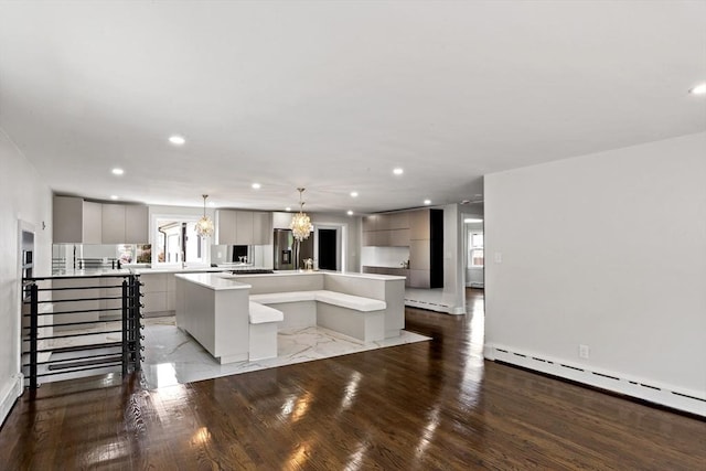 23 Donna St, Westport, MA 02790 - kitchen featuring a kitchen island, gray cabinetry, modern cabinets, a chandelier, and light wood-type flooring