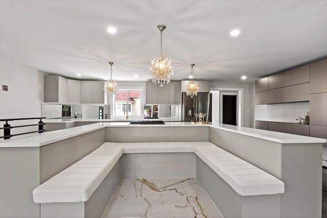 23 Donna St, Westport, MA 02790 - kitchen featuring stainless steel refrigerator with ice dispenser, a chandelier, light marble finish floors, modern cabinets, and recessed lighting