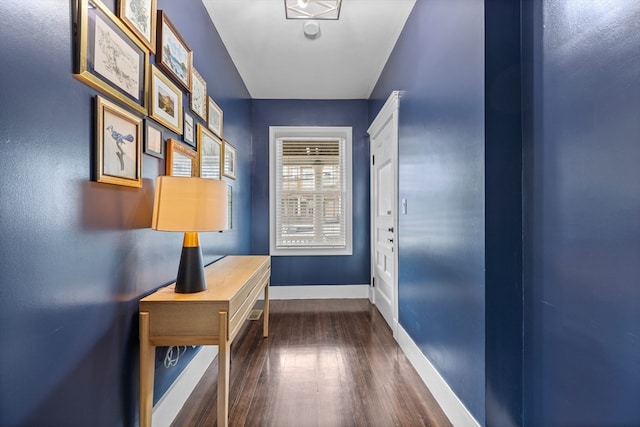 hall with dark hardwood / wood-style floors